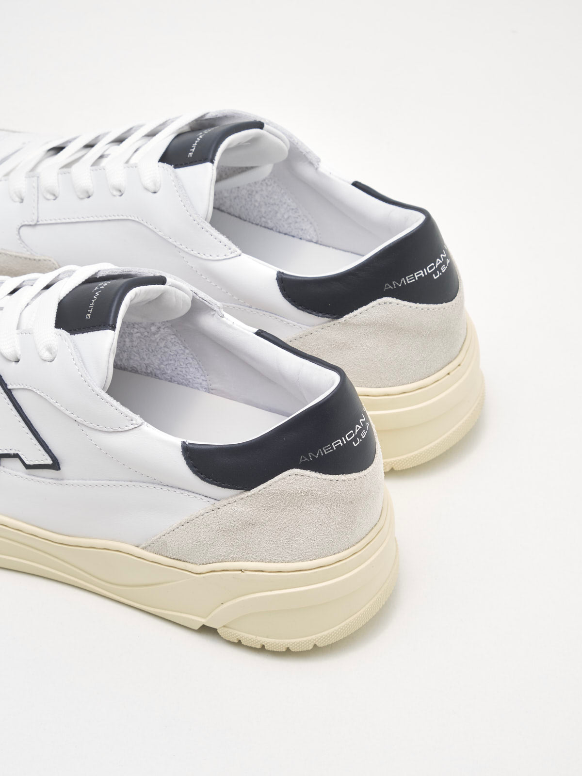 American White - Emmeuno Logo Explorer Man white black 