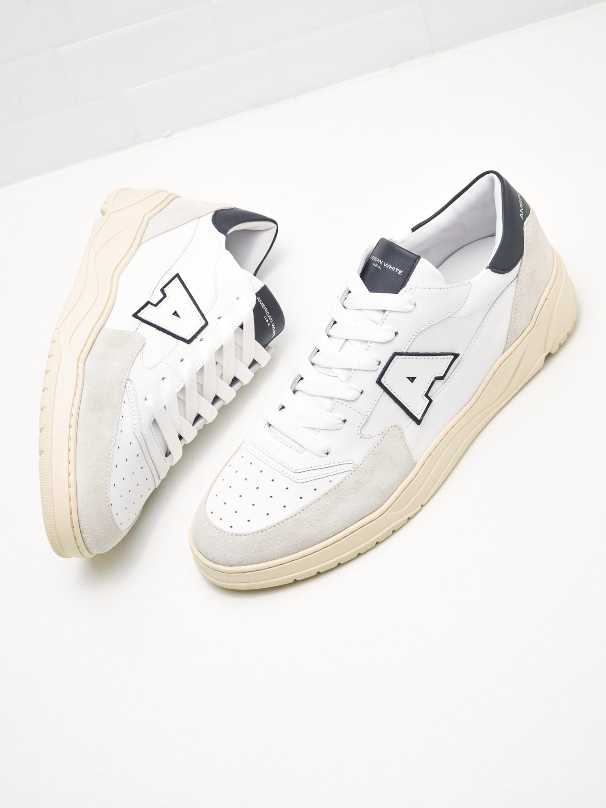 American White - Emmeuno Logo Explorer Man white black 