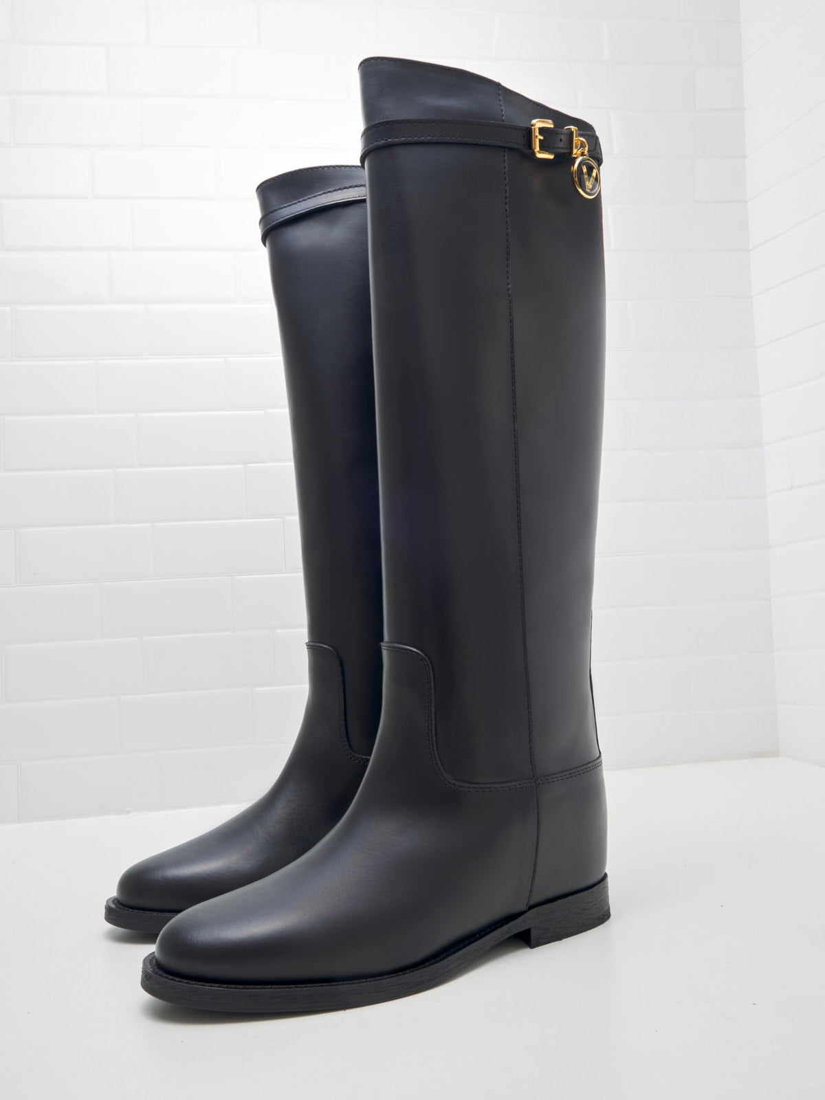 Black shops wedge riding boots